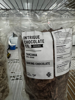 Intrigue Chocolate Co. bulk Tanzania Kokoa Kamili 78% baking chocolate in a labeled four-pound bag.